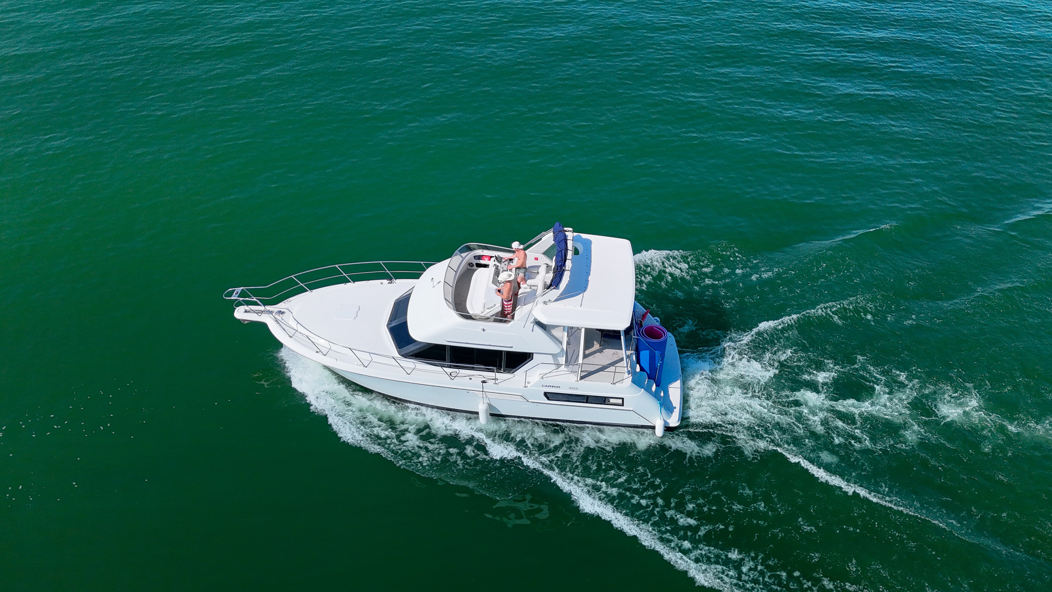 Aerial drone view of boat tour on Lake Travis